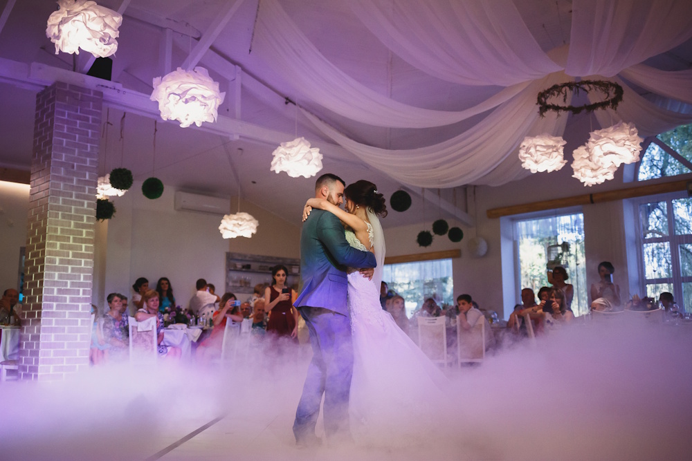 bride and groom dancing at reception